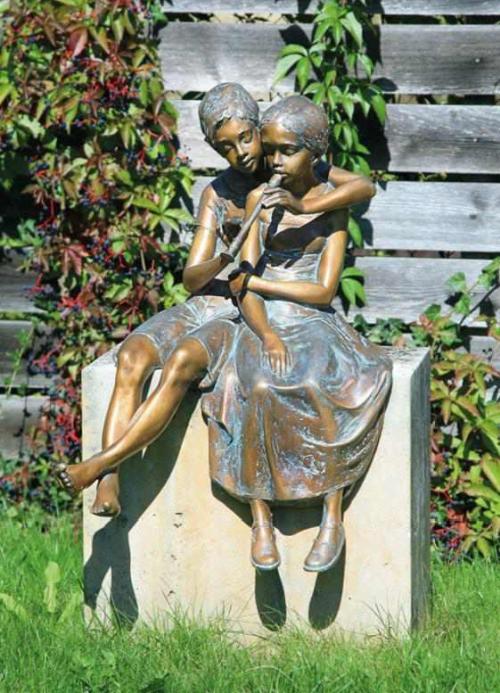 Bronze Figuren im Garten - Pflanzenfreunde